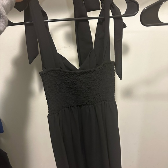 Black formal dress with slit. Hem hits mid-lower leg. Size medium. - Picture 6 of 6